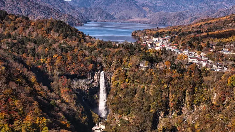 Nikko: Kegon Falls – A Symphony of Water and Leaves