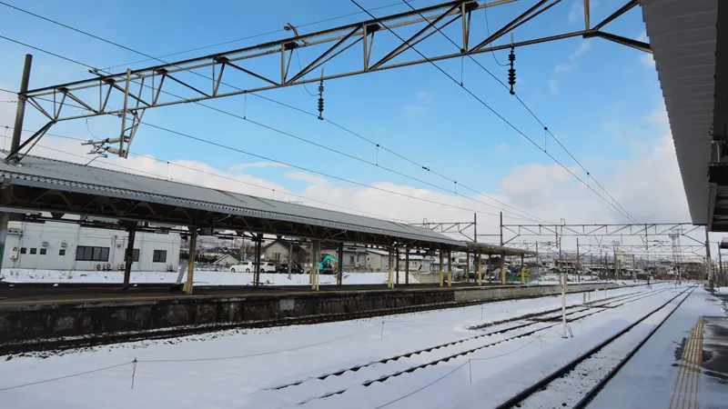 Snow-covered Hanamaki Station during winter