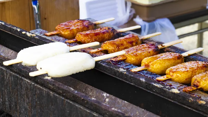 Grilled gohei mochi at street stall