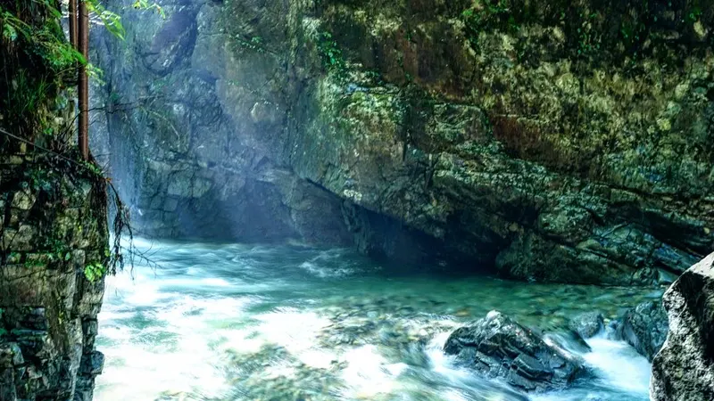 Cliffside view with clear stream