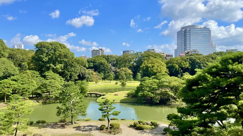 Rikugien Garden with high rise buildings